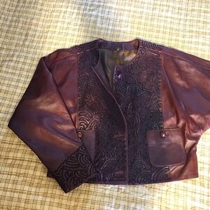 Leather batwing jacket with embroidered stiching